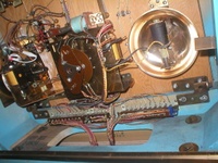 Image # 41810: Sing Along Inside Lower Backbox 
(Replay unit on left. Ball count unit in center. 100-point bell on right.)