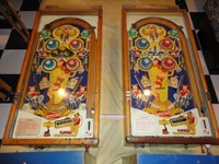 Image # 58257: Sittin' Pretty Sample Game - Playfield Comparison 
(The production playfield is on the left and should have white flipper rubbers. A Sample playfield is on the right and is missing its large center plastic. Serial number 22006 S.)