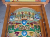 Image # 48759: Sluggin' Champ 'Deluxe' Upper Playfield 
(All plastic parts on this playfield are reproduction, as is the blue tray liner, but we show this image to present the playfield art and cabinet design.)