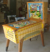 Image # 48764: Sluggin' Champ 'Deluxe' Cabinet - Right 
(All plastic parts on this playfield are reproduction, as is the blue tray liner, but we show this image to present the cabinet design.)
