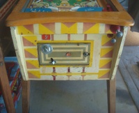 Image # 48765: Sluggin' Champ 'Deluxe' Cabinet - Front 
(The playfield plastic parts and blue tray liner are reproduction.)