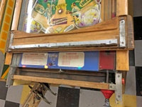 Image # 71657: Sluggin' Champ Under 'Deluxe' Lockdown Bar 
(The blue apron and the two cards mounted in it are reproductions. Serial number 064265 SC.)