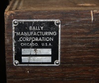 Image # 54715: Space Time Laminated Cabinet - Serial Number Plate 
(This game has a laminated cabinet. Serial number 5438.)