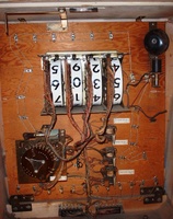 Image # 58608: Square Head Inside Backbox 
(Unterminated wires on the right side of the insert show where a bell and coil assembly had been removed from this game.)
