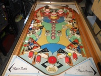 Image # 67679: Stage Coach Playfield 
(The color positions of the pop bumper caps and their skirts do not match the game in the manufacturer's flyer. The style of flippers shown here is not original to this game.)