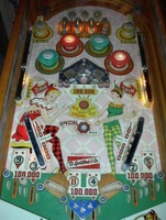 Image # 15609: Straight Flush Playfield 
(The blue cover is missing from the roto-target assembly, revealing two light bulb sockets.)
