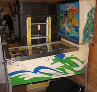 Image # 59763: Surfing Cabinet - Right 
(One of the pop bumper caps is not original to this game. Serial number 0383.)