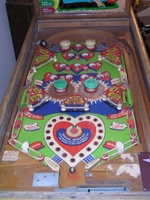 Image # 16838: Sweetheart Playfield 
(The post between the flippers is not original to this game.)
