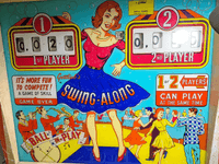 Image # 77511: Swing-Along Plastic Backglass - Modified in Italy 
(For each player, the silkscreened '1' has been replaced with a functioning score reel.)