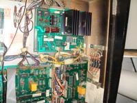 Image # 39443: Big Guns Inside Backbox - Right 
(The thick white wire on the left side in this image leads to a stand-alone battery holder in the upper right area of the backbox and is an after-factory modification. Serial number 557 118502. System 11A CPU.)