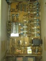 Image # 60022: 3 Jokers Sample Game - Motor Board 
(The cabinet is tagged '3 Jokers' with serial number 65384. The Sample motor board is tagged 'Straight Flush' with a handwritten serial number 61.)