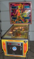 Image # 53435: Totem Sample Game Illuminated Front View 
(The backglass was identified to us as New Old Stock. Serial number 01415 S.)