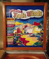 Image # 55311: Trade Winds Modified Backglass 
(This taller backbox required a taller backglass, and a band of blue silkscreening was added to the top and bottom of the glass.)