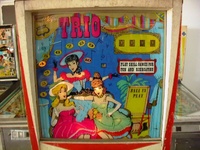 Image # 16777: Trio Illuminated Backglass 
(This game has serial number TR 2106.)
