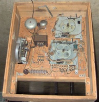Image # 51416: Tumbleweed Inside Backbox 
(The unit in the upper right corner has had some parts removed. Nearby, one of the bell units has been taken apart.)