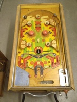 Image # 63293: Tumbleweed Playfield 
(A large round rollover button insert is missing in the lower playfield. The rubbers and bumper caps are also missing.)