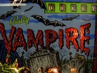 Image # 25994: Vampire Illuminated Backglass - Detail 
(Serial number 2275.)