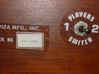 Image # 43220: War Serial Number and Player Switch 
(Serial number 130-2482.)