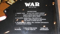 Image # 54371: War Instruction Card 
(The operator removed references to one-player operation.)