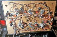Image # 69956: War Under Playfield - Kick-out holes present