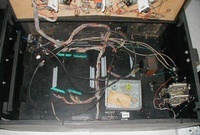Image # 18252: War Inside Cabinet 
(The power supply board and the control board have both been removed from this game, leaving the connectors laying in the cabinet.)