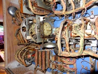 Image # 53452: The Wiggler Backbox 0-9 Unit 
(The 0-9 unit (match unit) is in the center and has a bell underneath. Its identifying tag is located on its other side. Serial number 2765.)