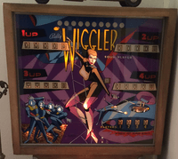 Image # 74330: The Wiggler Backglass - Modified For 5-Digit Scoring 
(The ten match numbers were modified to appear in white circles.)