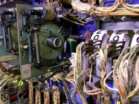 Image # 53455: The Wiggler Backbox Add-A-Ball Unit 
(This is a factory-installed unit. Its two coils allow it to step both up and down. Serial number 3022.)