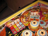 Image # 26859: Wild Fyre Upper Left Playfield 
(The spinning target shown in this image is not original to this game.)