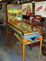 Image # 37534: Wild West Cabinet - Left 
(The right side of the lower cabinet shows a shift of color from dark blue to light blue. This light blue extends to the cabinet front. The remainder of the cabinet shows dark blue. The owner did not explain the reason for the lighter blue color.)