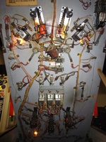 Image # 57999: Wild Wheels Under Playfield 
(The right flipper coil is dangling loose in this picture.)