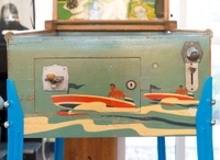 Image # 77432: Wisconsin Cabinet - Front - Rolldown Version 
(The manufacturer produced this game with a wood console base but an owner replaced it with the legs shown here. Serial number 3392.)