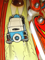 Image # 78798: Wizard! Playfield - Artist Initials 
(The license plate shows the initials for artist Dave G. Christensen.)