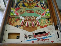 Image # 16022: World Beauties Lower Playfield 
(The four red ball guides and the four yellow ball guides have switched positions on this game.)