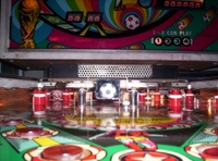 Image # 33319: World Cup Playfield - Ball View 
(The spinning target artwork at center playfield is not original to this game.)