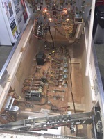Image # 65640: Zig Zag Inside Cabinet 
(The long brown cord on the right of the motor board is for an after-factory power switch mounted in the front end of the cabinet bottom.)
