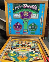 Image # 83385: Duette Deluxe Cabinet - Front View 
(This playfield is missing its rubber rings and both flippers.)