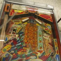 Image # 71599: Evil Fight Lower Playfield - Downfield View 
(The hole from one of two missing star rollover inserts can be seen in this image.)