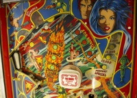 Image # 71593: Evil Fight Upper Playfield 
(The hole from one of two missing star rollover inserts can be seen in this image.)