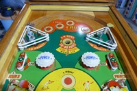 Image # 63511: Hits and Runs Upper Playfield 
(The left-side ballplayer figurine is not original to this game and has been repainted as well. The pop bumper caps have been touched up with blue ink. Serial number A1283.)