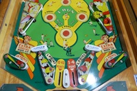 Image # 63512: Hits and Runs Lower Playfield 
(The flippers have been touched up with blue ink. The elevated screws below the flippers and at the right drop lane 10-point rebound rubber are not original to this game. Serial number A1283.)