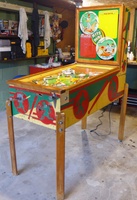 Image # 63526: Hits and Runs Cabinet - Full View 
(The left-side ballplayer figurine is not original to this game and has been repainted as well. The elevated screws below the flippers are not original to this game. Serial number A1283.)