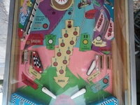 Image # 60073: Last Lap Lower Playfield 
(The pop bumper cap is not original to this game.)