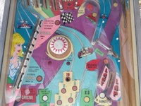 Image # 60072: Last Lap Middle Playfield 
(The pop bumper cap is not original to this game.)