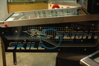 Image # 52189: Skill Flight Cabinet - Right 
(This cabinet art is on the wood, not a metal veneer from a kit.)