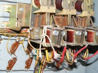 Image # 64264: Miss Universo (3 Ladies) Inside Backbox - Detail 
(A braided string has been tied to this relay, likely as a temporary solution to a repair issue.)