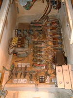 Image # 55875: Supersonic Early Production - Inside Cabinet 
(The chime unit on the lower right is not original to this game. The white cable and wire for this chime unit can be seen stapled to the cabinet wall and going to the backbox where the manufacturer's sound card and speaker used to be. Serial number 0003.)