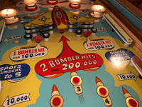 Image # 74474: Bomber Illuminated Middle Playfield 
(The manufacturer did not use black rubber rings on this game.)