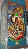 Image # 39676: The Raid Playfield 
(On this playfield, a red rubber ring has been used to block entry to the right outlane.)