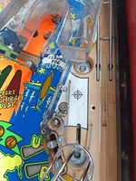 Image # 77588: Al's Garage Band Goes On a World Tour Early Production Playfield - Top Ball Lock VUK - Plastic Removed 
(The plastic light shield has been removed to show this area.)
